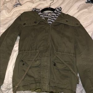 Green women’s army jacket with striped hood